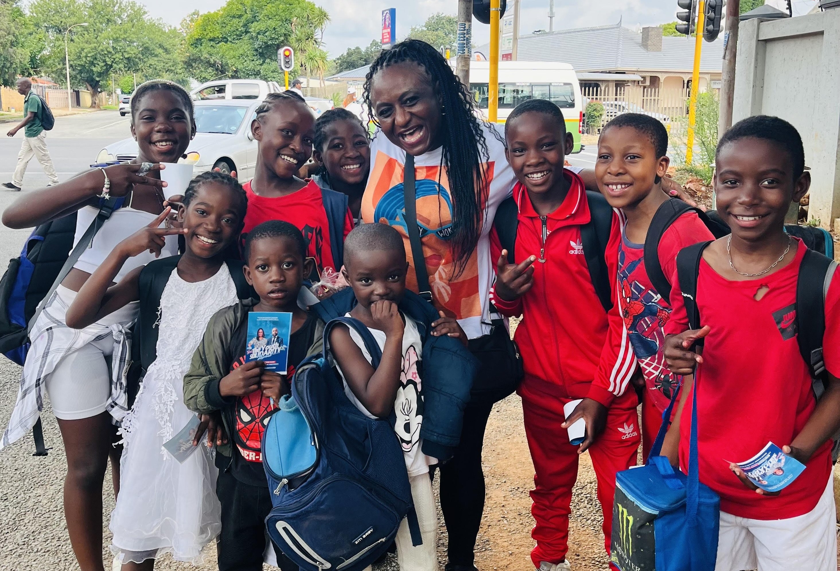 Shanna McGuire and Children at the Combined Farm School
